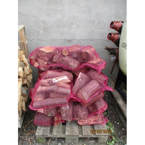 53 - Ten bags of seasoned logs