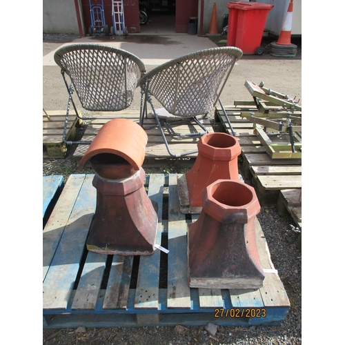 80 - Three terracotta chimney pots one fitted with a cowl