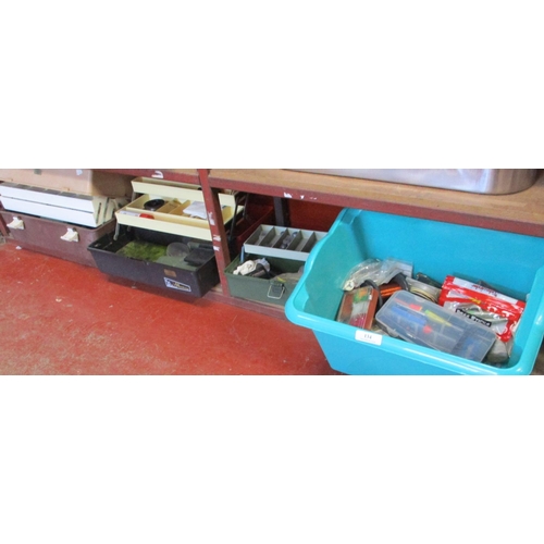 134 - Three cantilever fishing tackle boxes together with a large quantity of fishing tackle