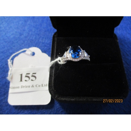 155 - A silver ring with blue (size K)