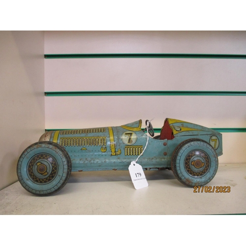 179 - A tin plate clockwork model of a vintage racing car