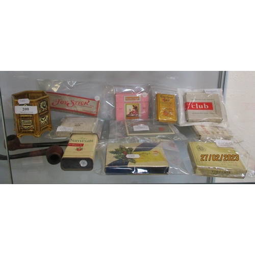 200 - Various packets of vintage cigarette together with two smoker's pipes