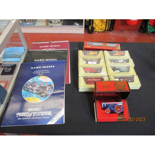 230 - A collection of Matchbox diecast model vehicles together with three Matchbox calendars