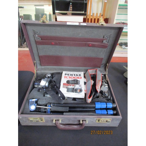 235 - A Pentax camera set in fitted case