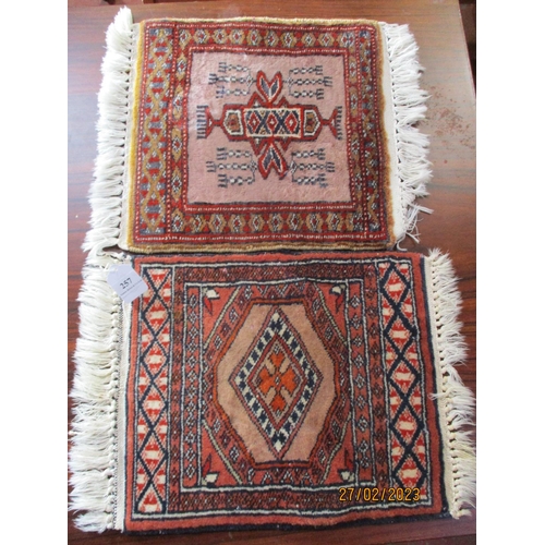 257 - Two oriental prayer rugs of diminutive form