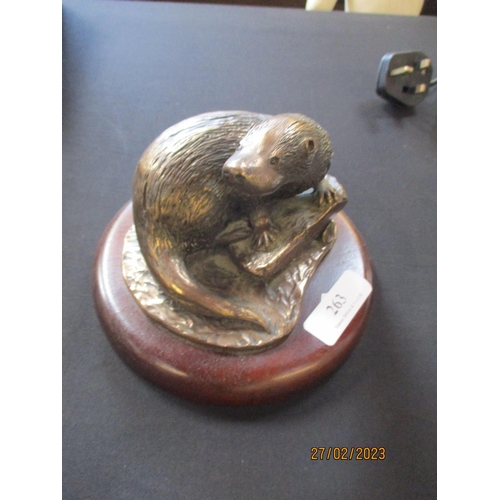 263 - A bronzed sculpture of an otter