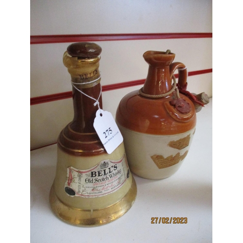 275 - A decanter of Bell's Old Scotch Whisky together with a flagon of Monk's Scotch Whisky