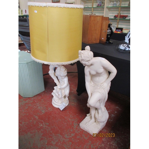 285 - A statuette of a Neo Classical semi nude woman together with a similar table lamp modelled in the fo... 