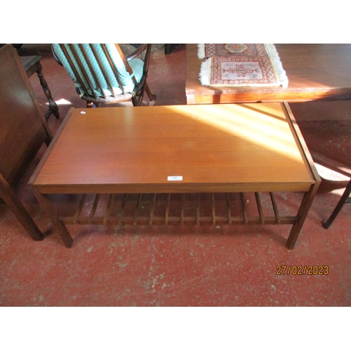 289 - A mid century teak rectangular coffee table fitted a slatted under tier