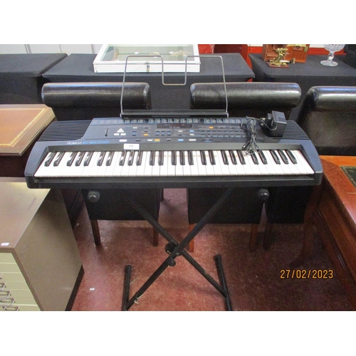 293 - A Roland E-16 Intelligence synthesiser and stand