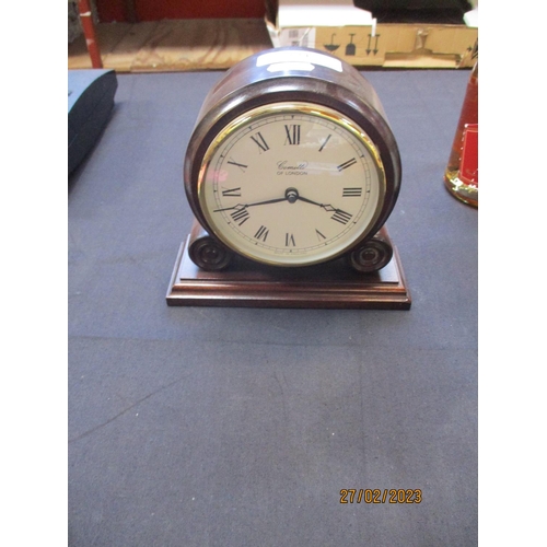 321 - A mahogany cased mantle clock by Comitti of London