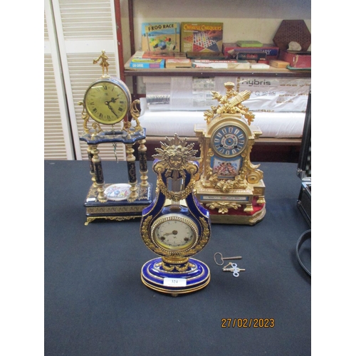 324 - Three ornate mantle clocks