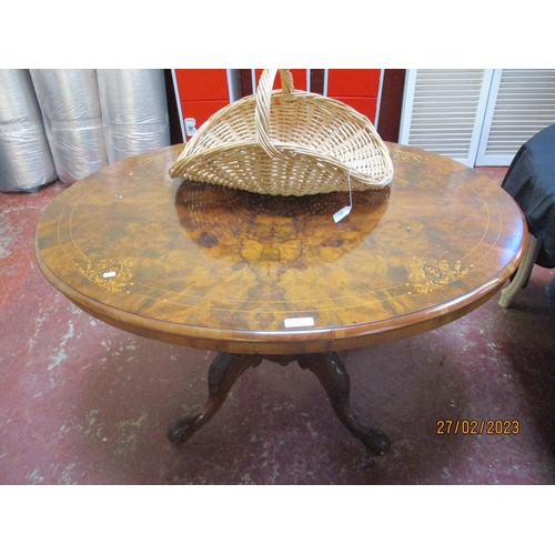 327 - A mid Victorian burr walnut tilt top centre table with marquetry inlay