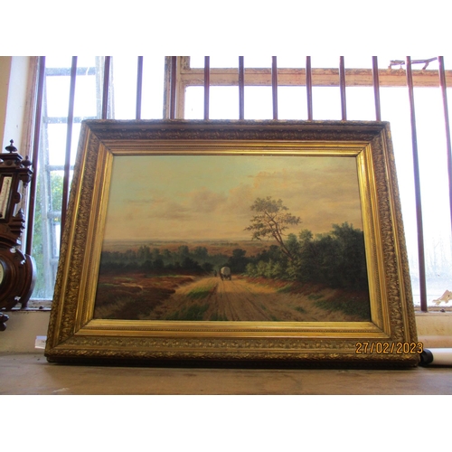 342 - Landscape with horse drawn covered wagon and figure, oil on canvas BY Hugo Anthony Peter Swaen