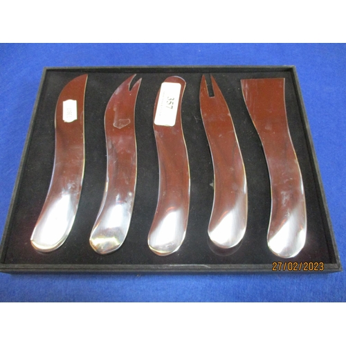 357 - A boxed set of five cheese board utensils