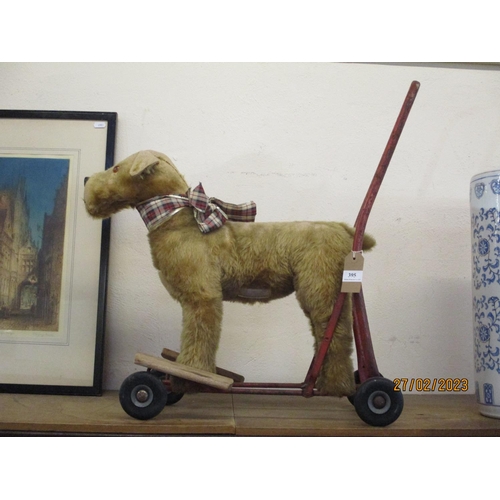 395 - A vintage Pedigree soft toys dog on wheels