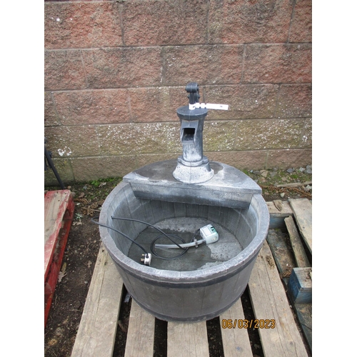 58 - An electrically operated garden water feature modelled in the form of a cask and hand pump