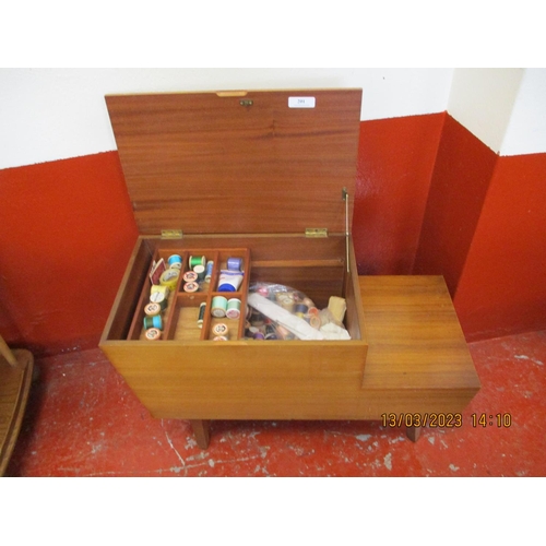 201 - A mid century teak work box fitted two short drawers