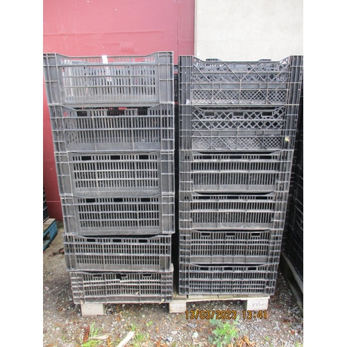 58 - Thirty black plastic stacking storage crates