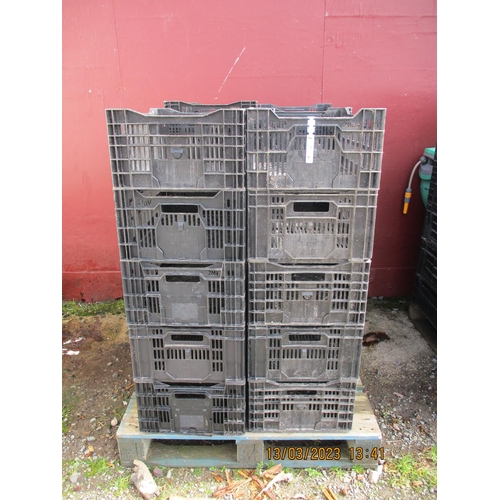 59 - Twenty black plastic stacking storage crates