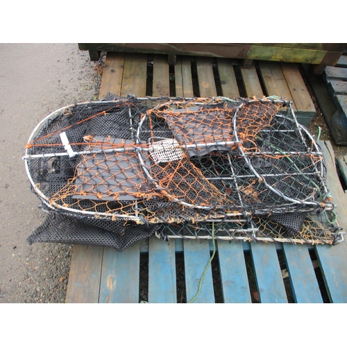 108 - Three galvanised framed collapsible fishing pots