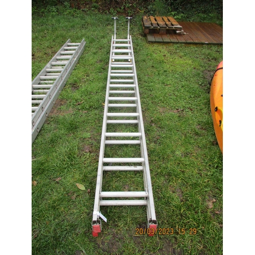 26 - An aluminium twelve tread double extension ladder with roof bracket - Liquidator's sale