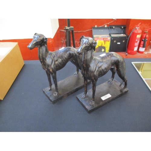 265 - A pair of bronzed greyhound models