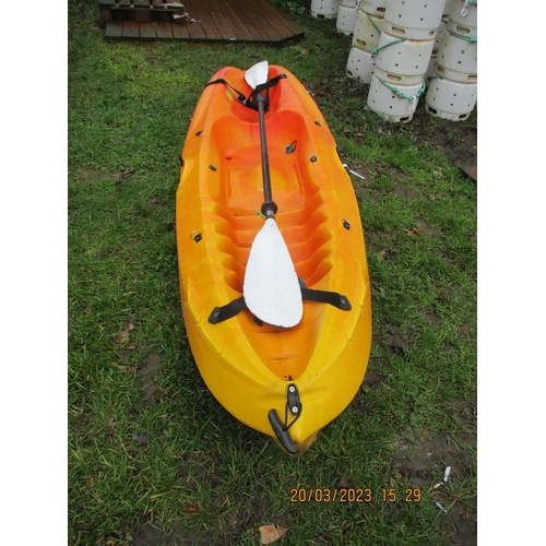 27 - An RTM Mambo kayak and paddle