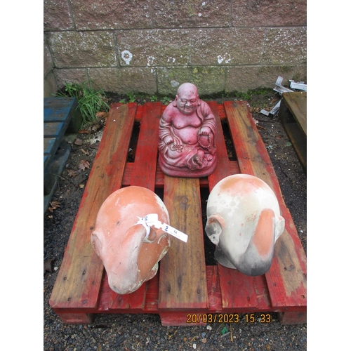 54 - A pair of terracotta elephant models together with a reconstituted stone model of a buddha