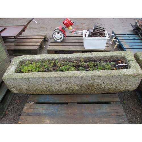 87 - A well cut rectangular Jersey granite trough (140cm long, 40cm wide)