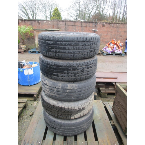 89 - A set of five aluminium wheels complete with tyres to suit Nissan Navara