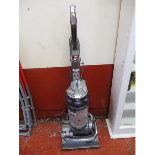 A Dyson DC14 upright vacuum cleaner