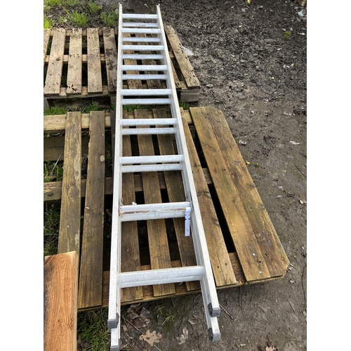 29 - An aluminium nine tread double extension ladder