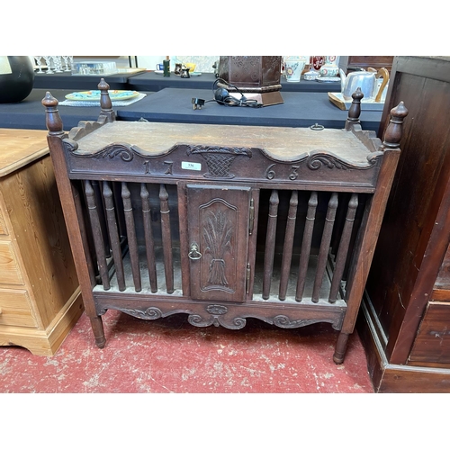 A vintage French bread cupboard inscribed with the date 1763