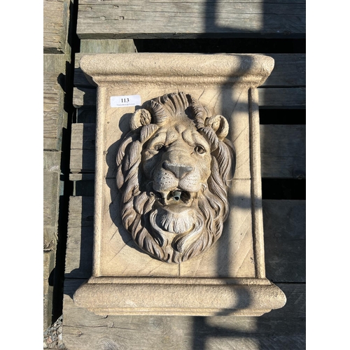 113 - A reconstituted stone wall fountain modelled in the form of a lion
