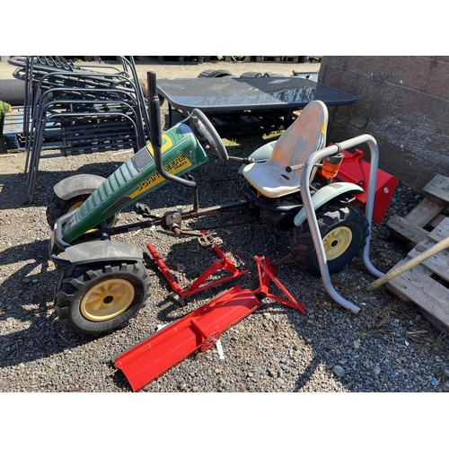 50 - A John Deere Traxx pedal cart complete with bucket, pallet fork and levelling blade attachments