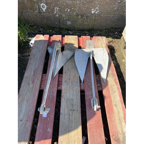 62 - Two galvanised anchors