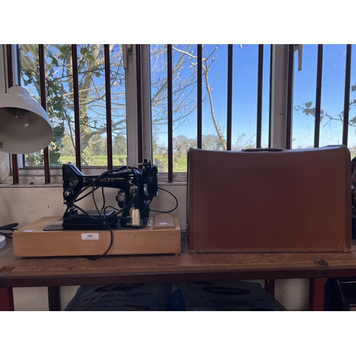160 - A mid century Singer electric portable sewing machine