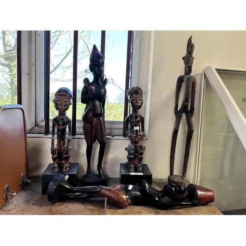 161 - Five African carved wooden figures