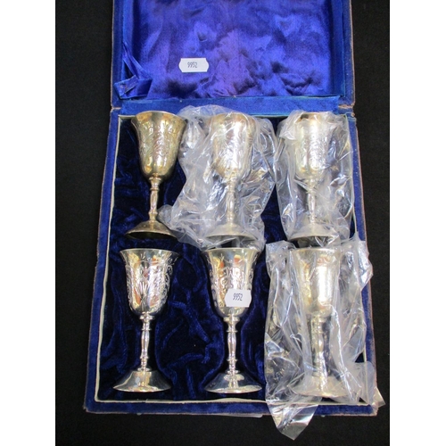 347 - A cased set of six white metal goblets