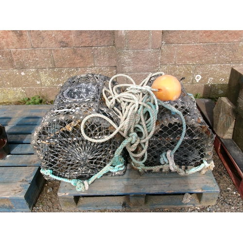 33 - Two parlour lobster pots complete with backline and float