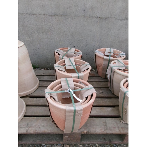 51 - Three sets of three graduated terracotta flower pots - new