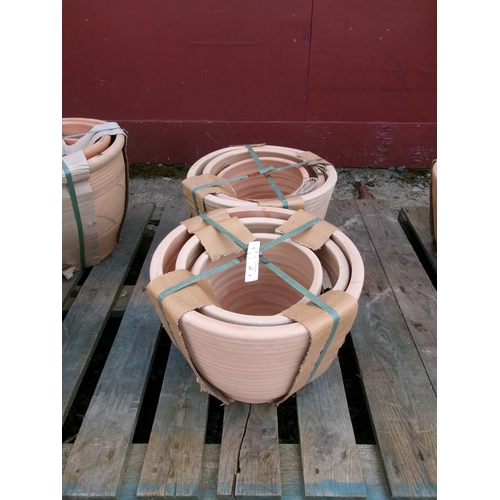 57 - Two sets of three graduated terracotta planters - new