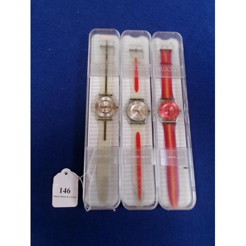 146 - Three Swatch wrist watches in original boxes