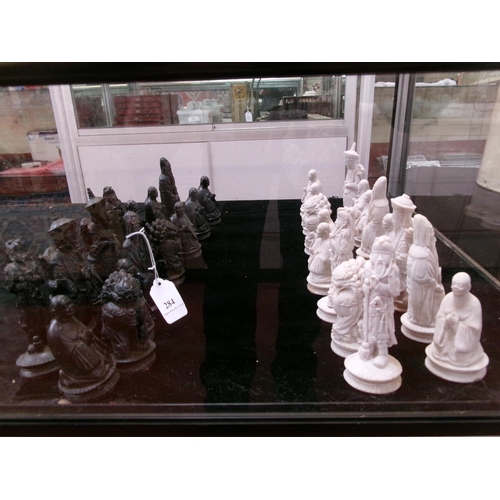 284 - A set of oriental figural chess pieces