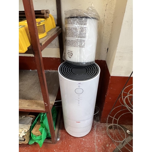 442 - A Vax portable cylindrical air filter complete with spare filter