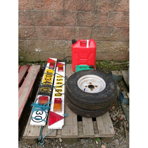 43 - Two trailer wheels, two light boards, fuel cans etc.