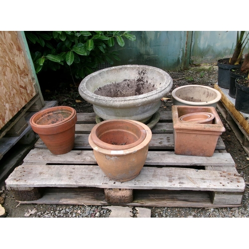 56 - A collection of terracotta pots and planters