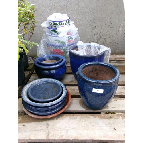 67 - A quantity of ceramic plant pots