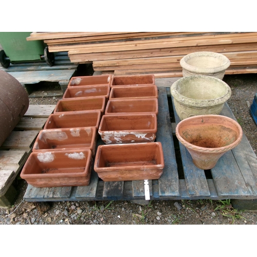 75 - Eleven terracotta troughs together with three pots